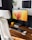 An organized workspace featuring various computer accessories and storage devices.