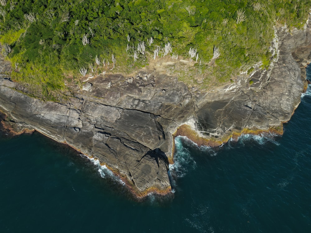 an aerial view of an island in the middle of the ocean