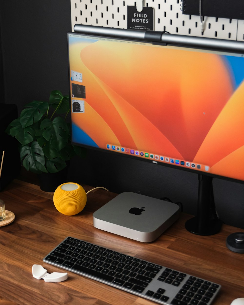 a desktop computer sitting on top of a wooden desk