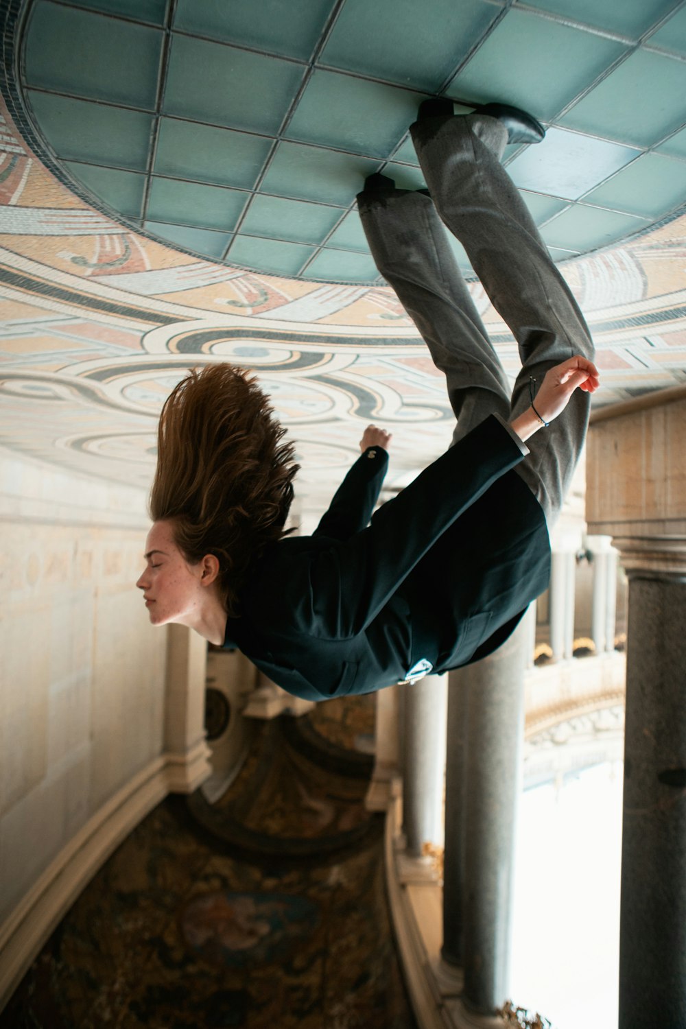 a man flying through the air while riding a skateboard