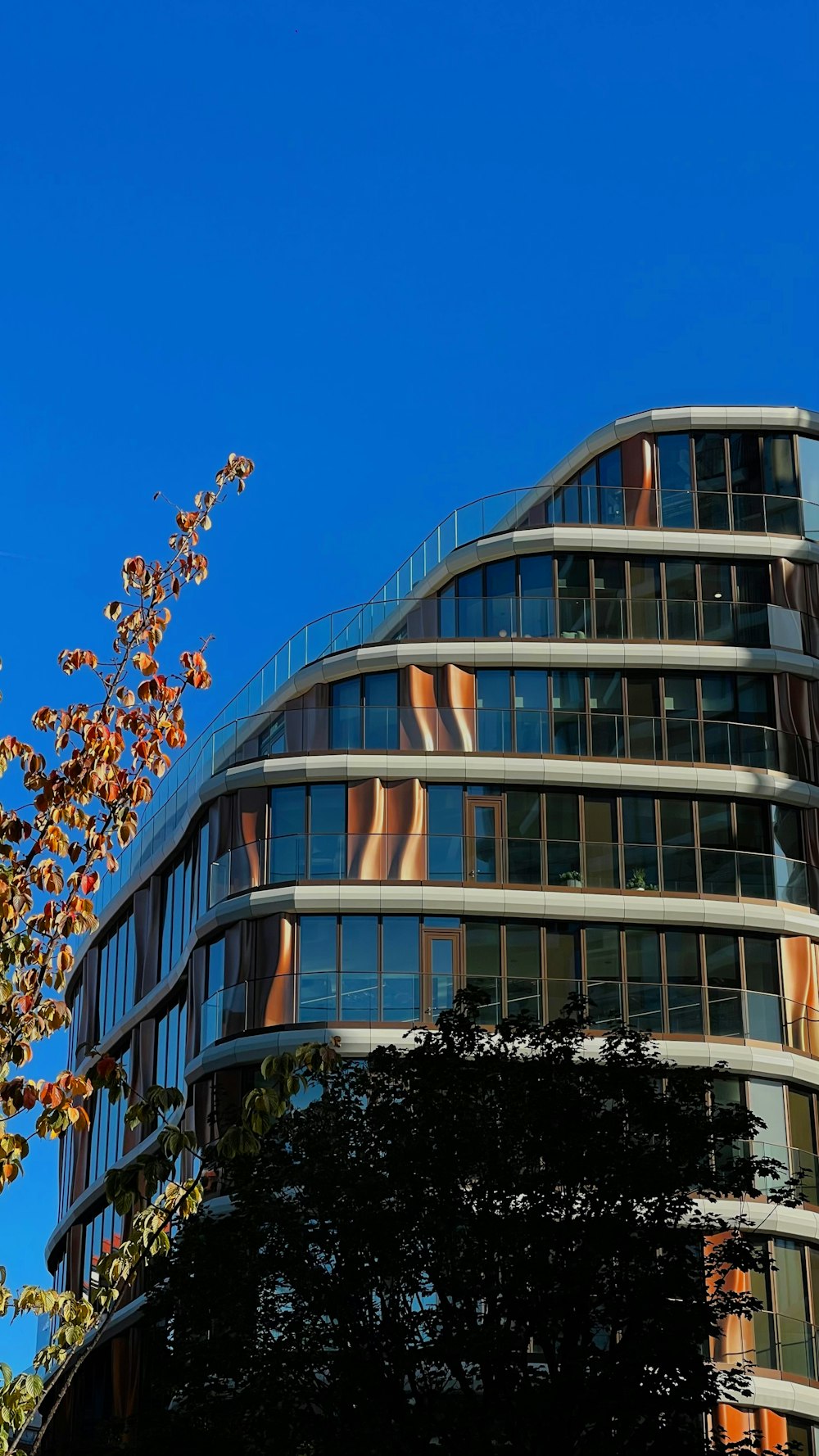 a tall building with a clock on the side of it