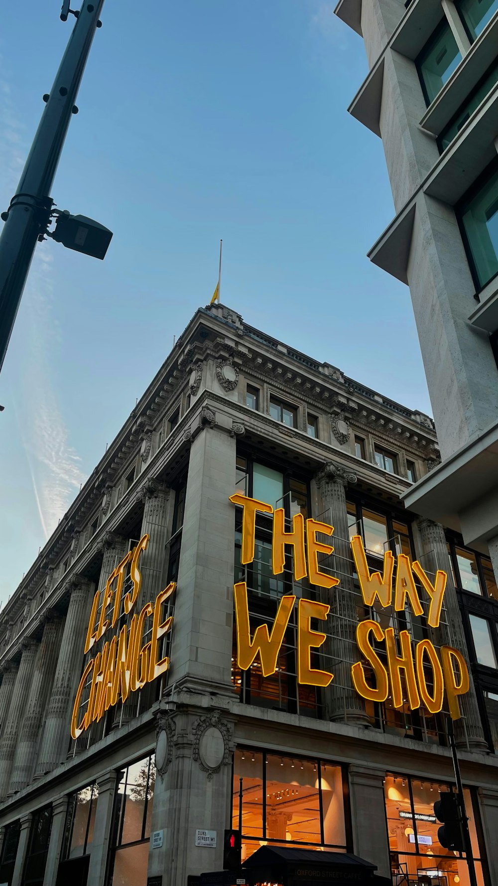 a building with a sign that says the way we shop