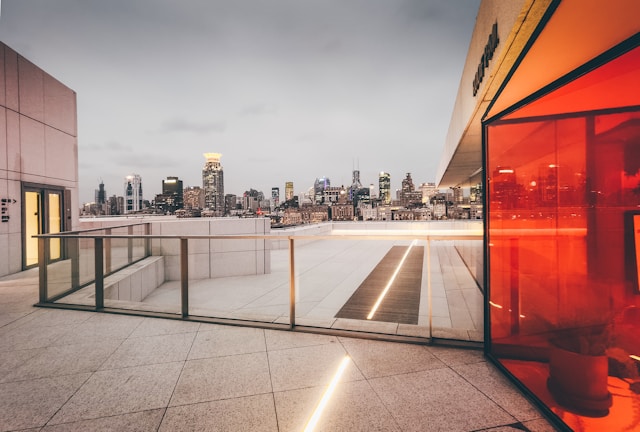 Urban rooftop terrace with contemporary design and city skyline views.