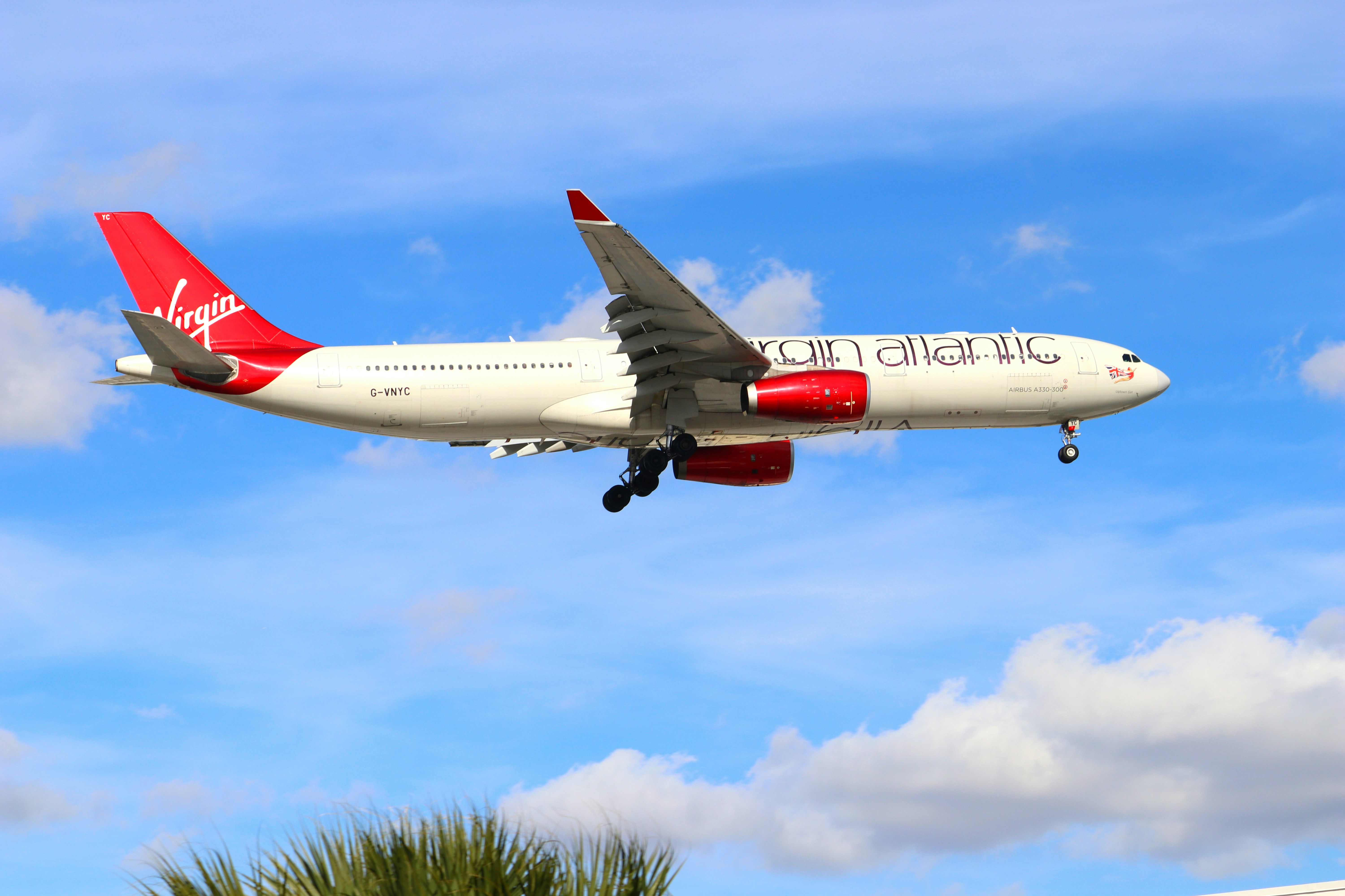 a virgin atlantic plane flying in the sky, Virgin Atlantic Airways Airbus A330 Landing