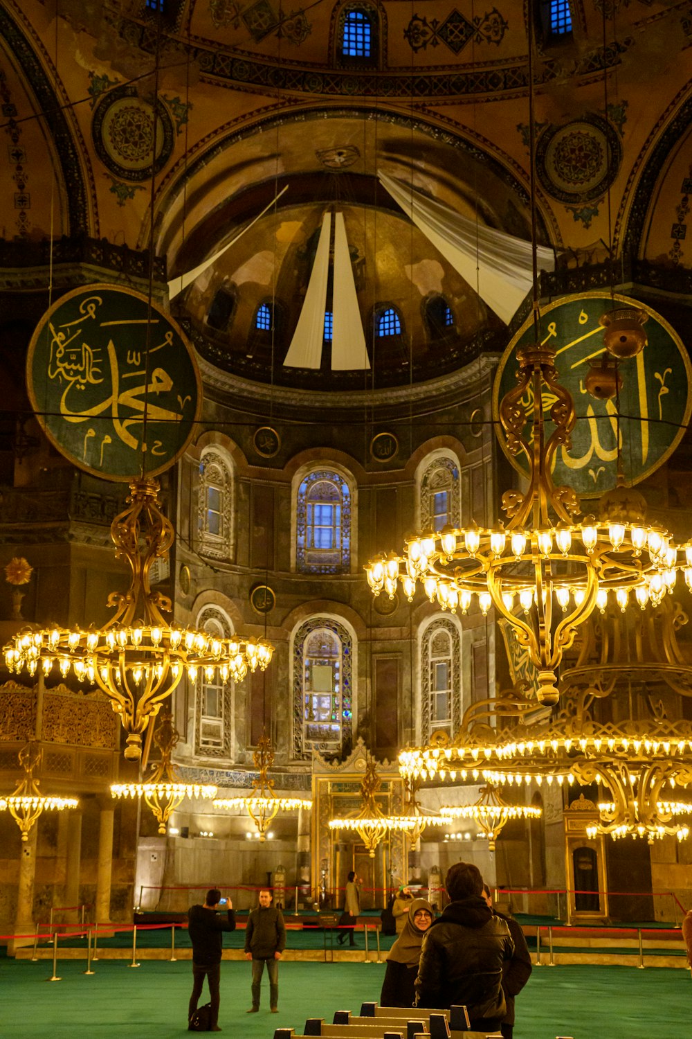 the interior of a building with chandeliers and chandeliers