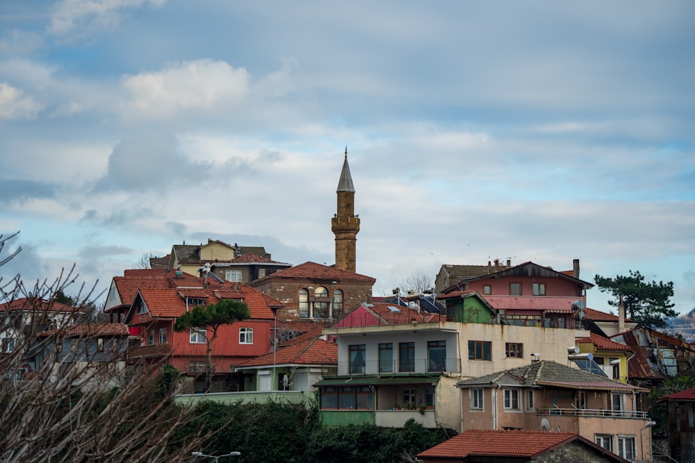 a large clock tower towering over a city