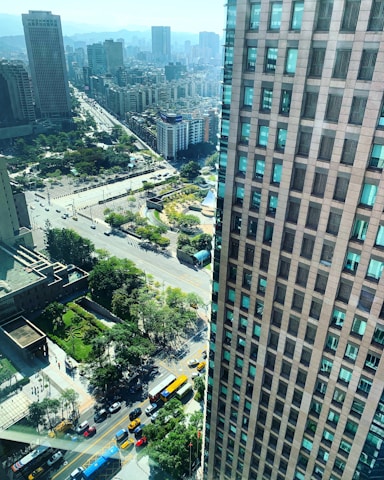 Aerial view of a busy urban area in Saudi Arabia with buildings and streets.