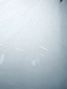 Water droplets gently falling on a treated basement surface with subtle ripple effect.