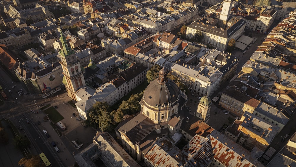 an aerial view of a city with tall buildings