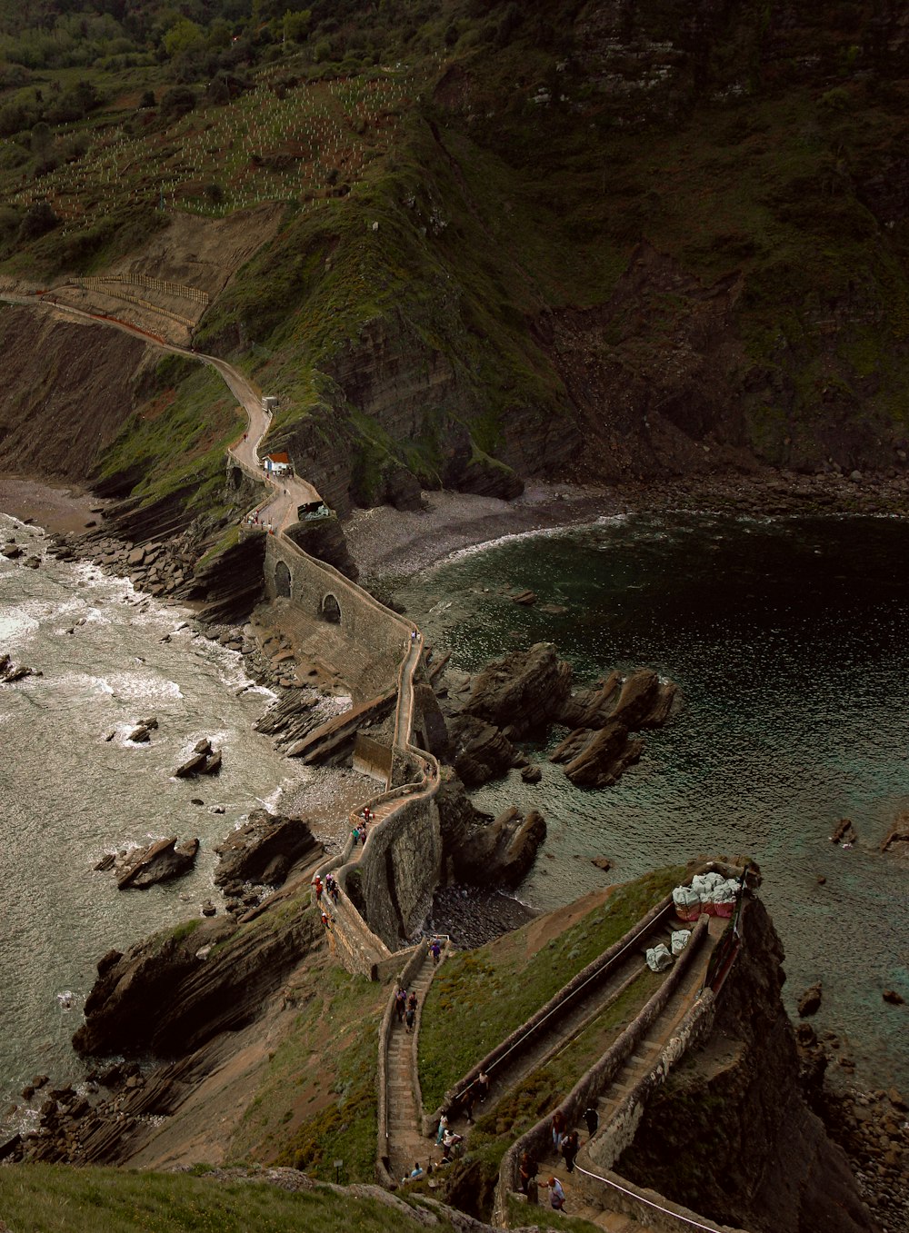 a scenic view of the ocean and a road