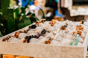 A variety of stylish bracelets showcased on a soft surface.