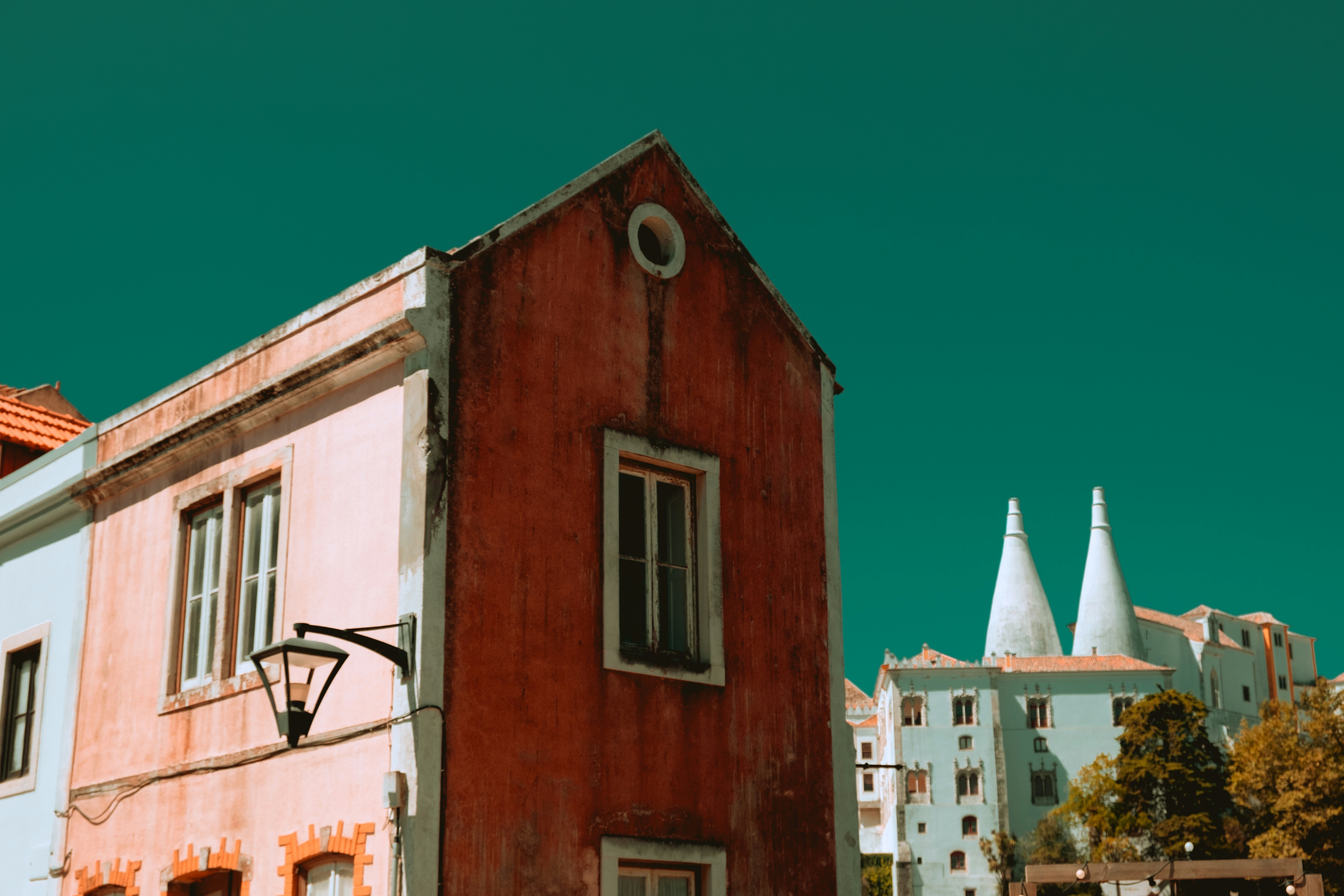 a red building with a basketball hoop in front of it