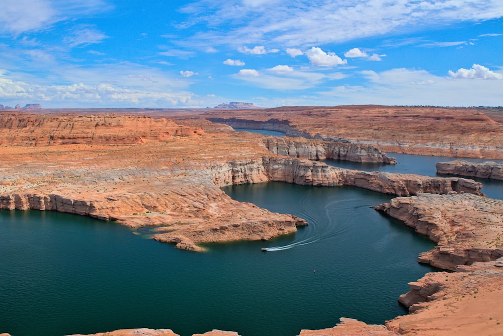 a large body of water surrounded by rocky cliffs