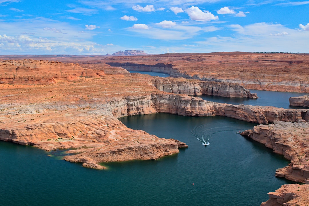a large body of water surrounded by mountains,