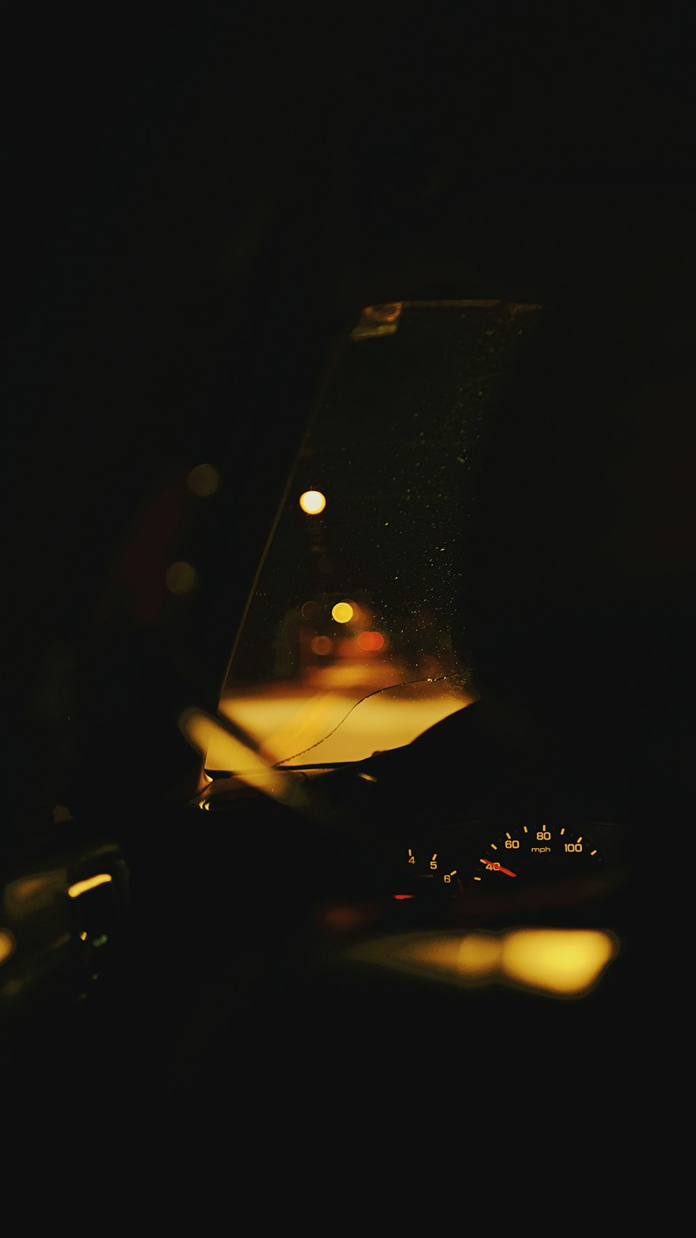 a close up of a computer keyboard in a dark room