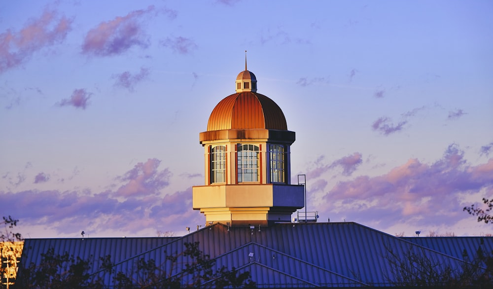 a dome on top of a building with a sky background