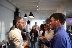 a group of people standing in a room