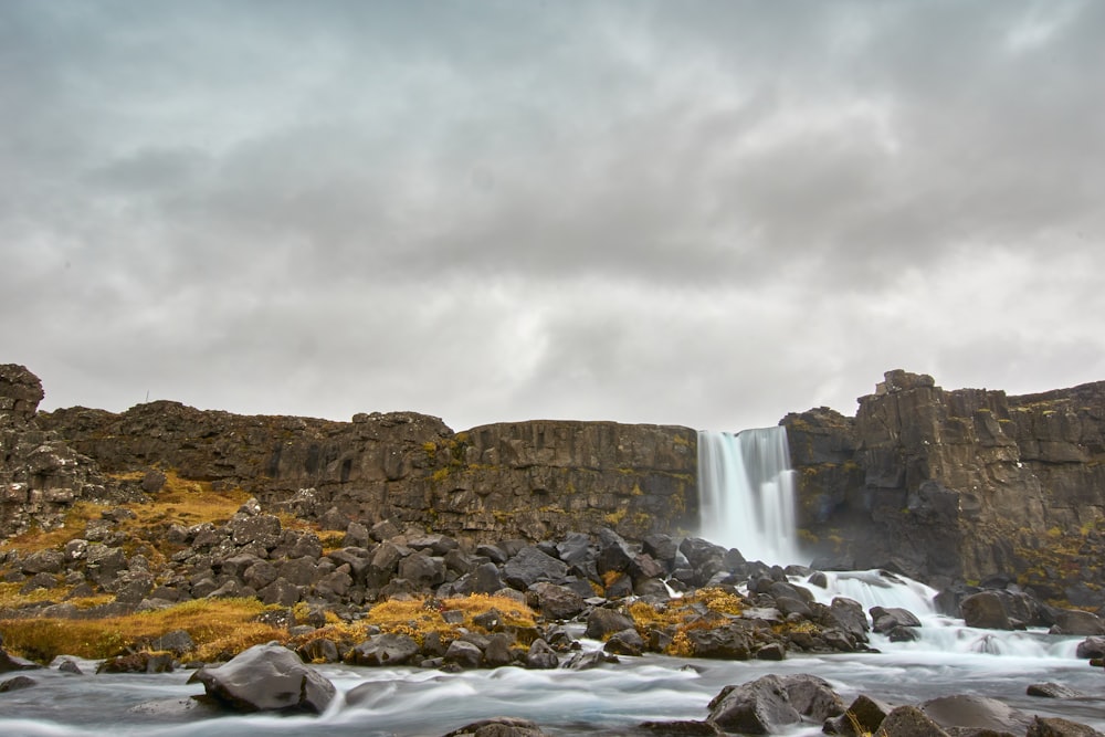 a waterfall with a large amount of water coming out of it