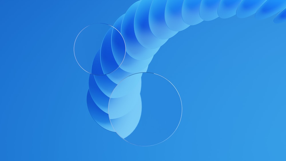 a blue background with a curved object in the middle