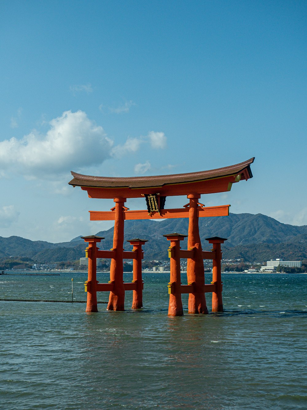 a body of water with a large structure in the middle of it