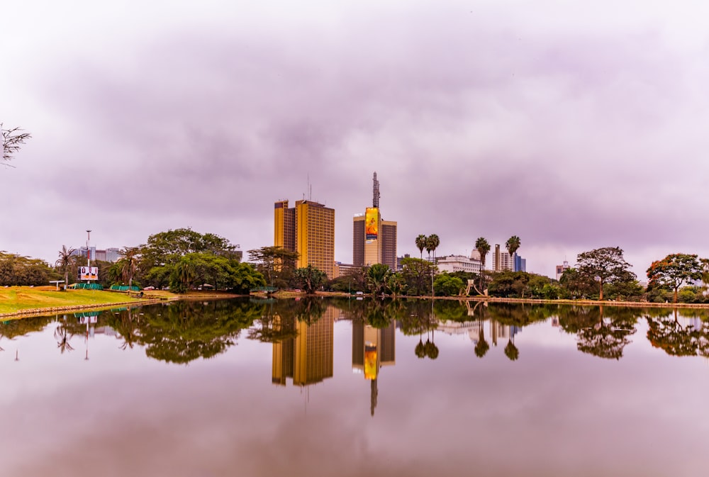 a large body of water with a city in the background