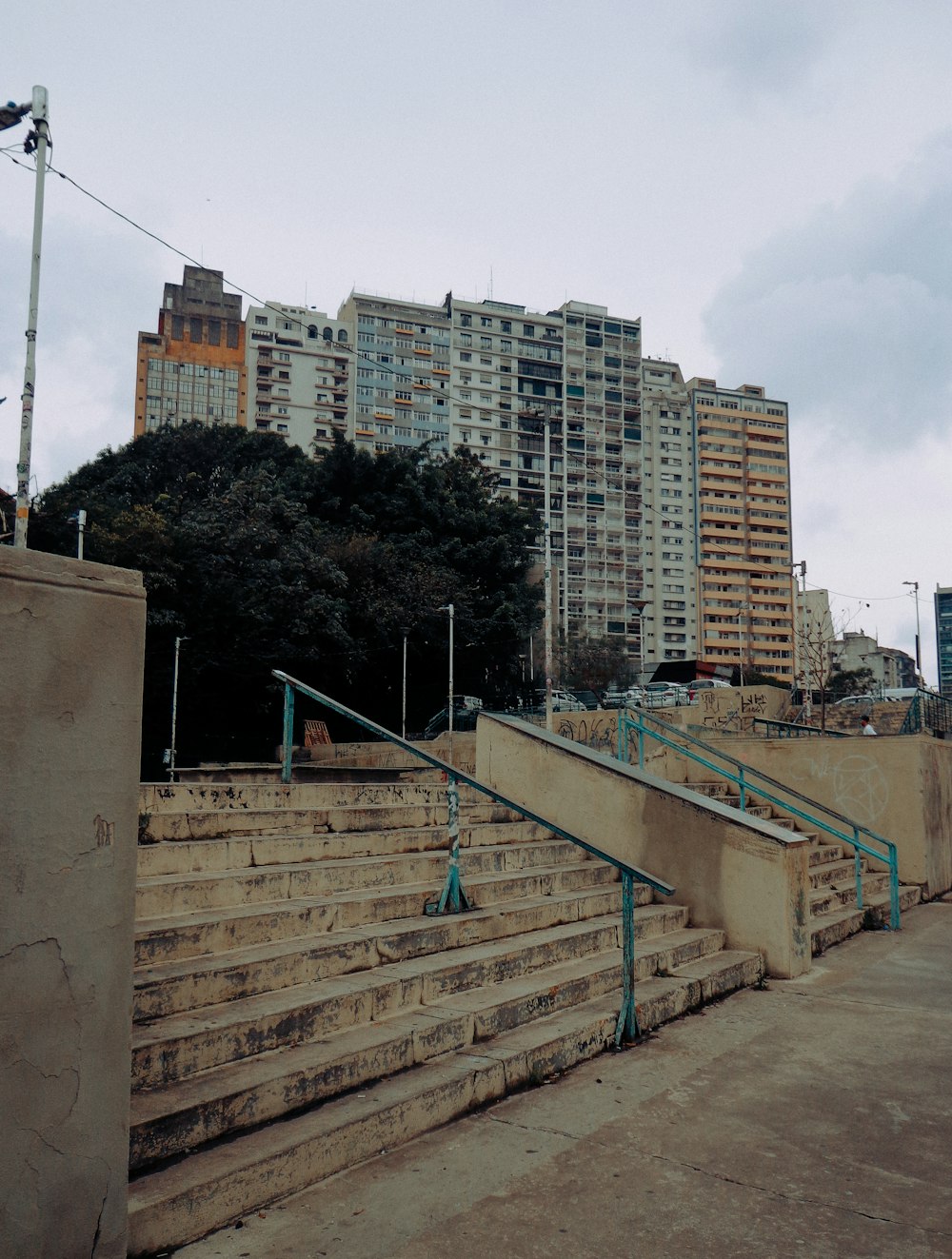 a set of stairs leading up to some buildings