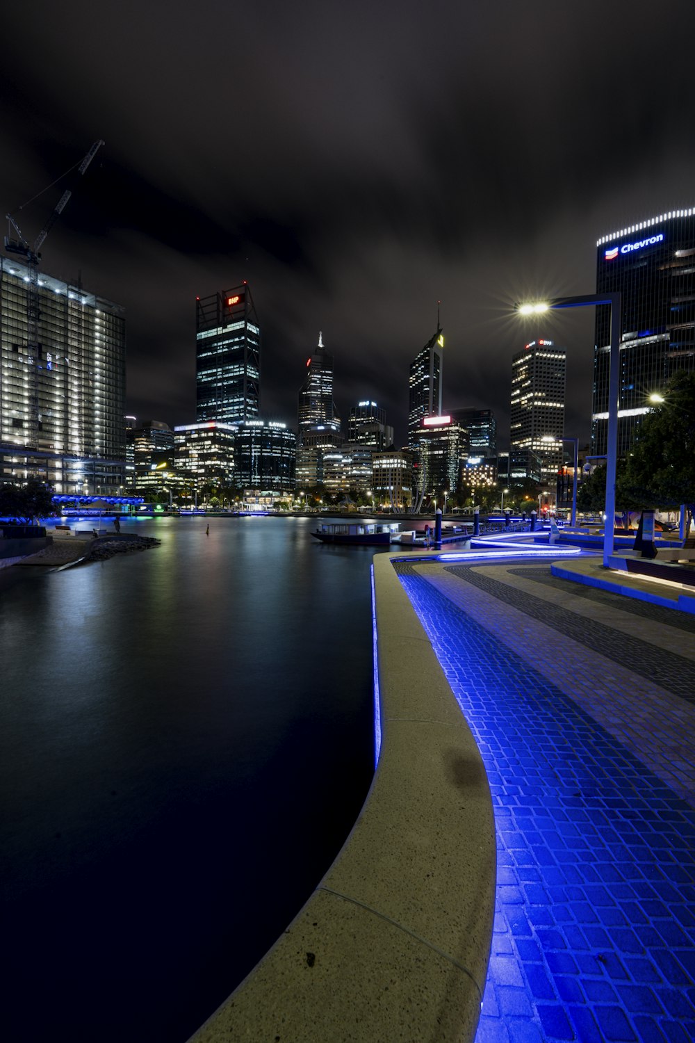 a view of a city at night from across the river