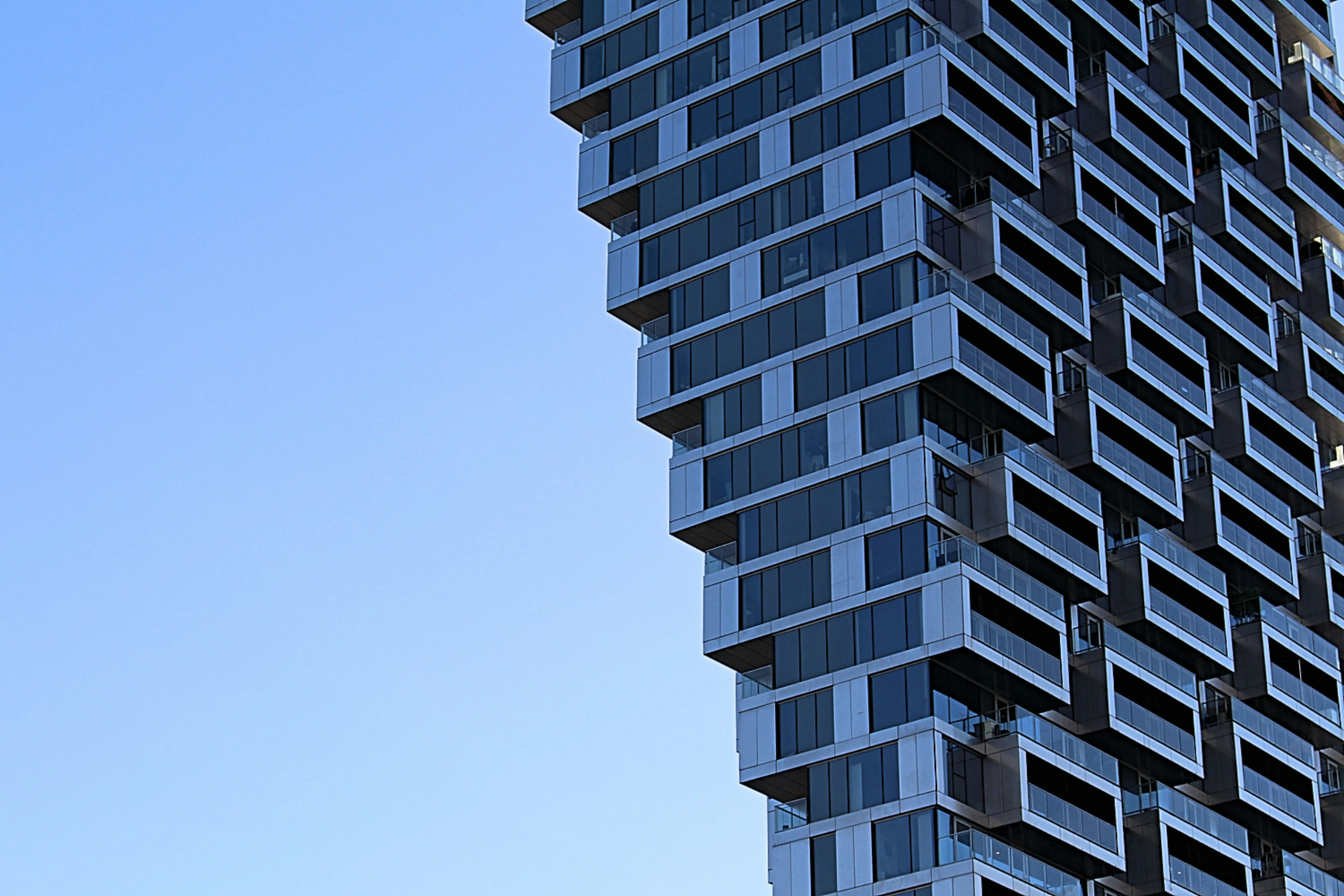 a very tall building with lots of windows, 