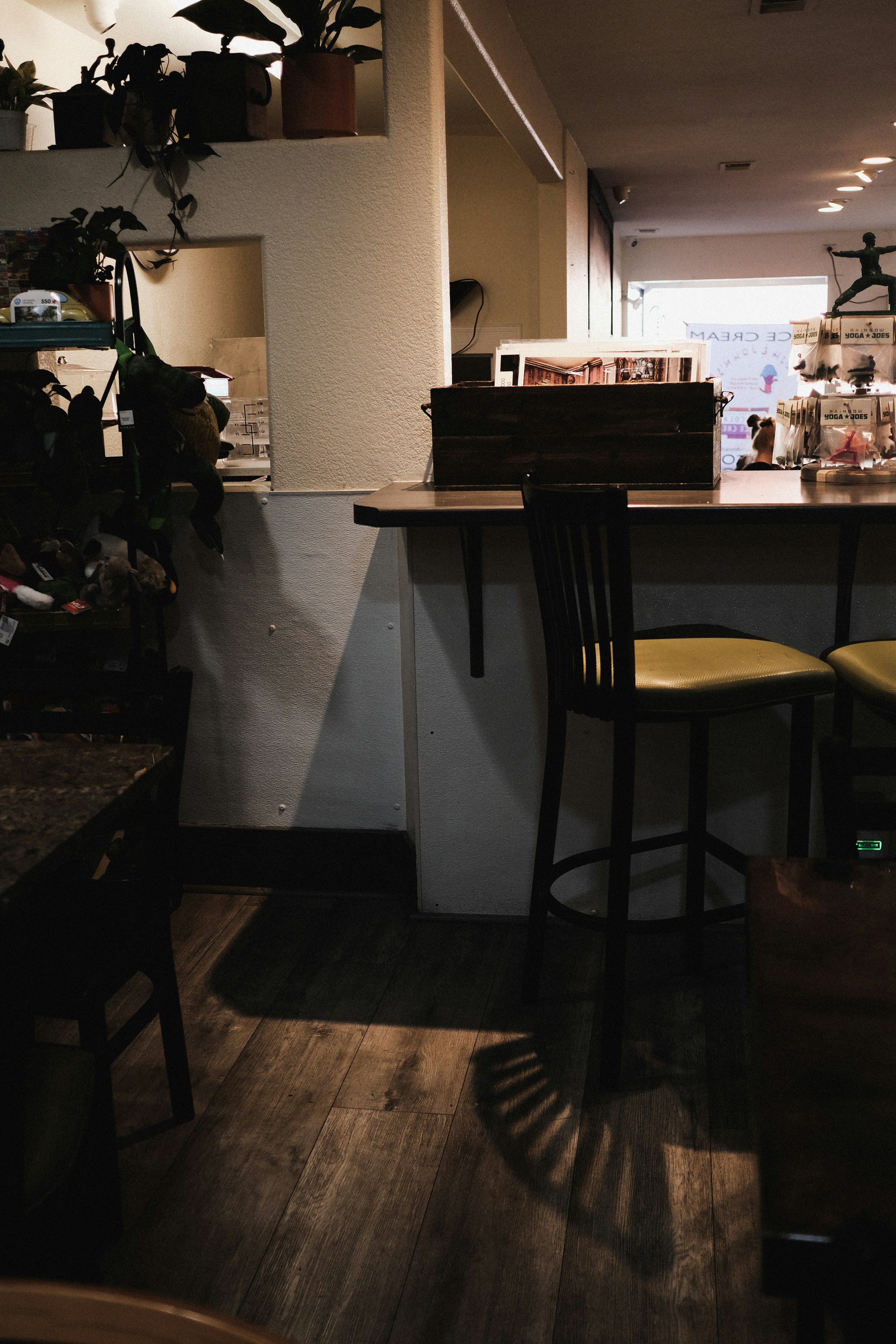 a table and chairs in a small room