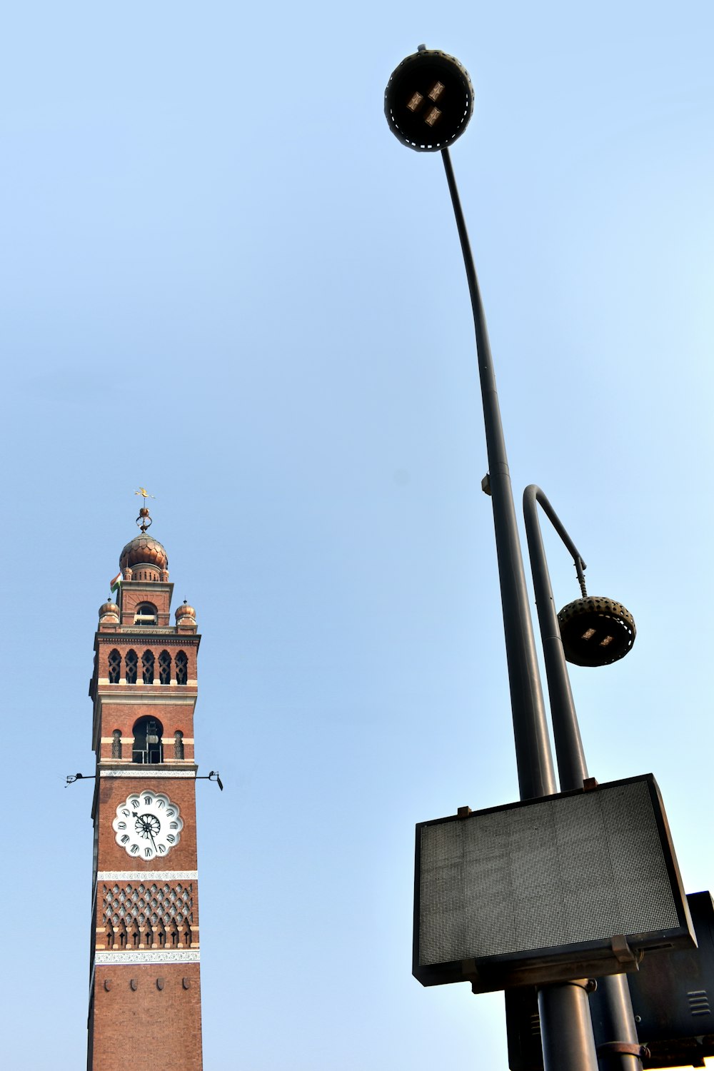 a tall clock tower towering over a city