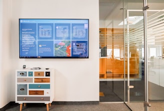 a television mounted to a wall in a room