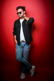 Man wearing casual stylish clothes from cool 50 guys collection, standing relaxed in urban background