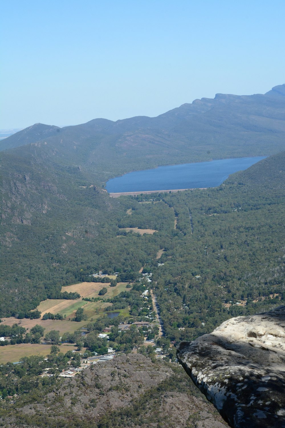 a view of a valley and a lake from a high point of view