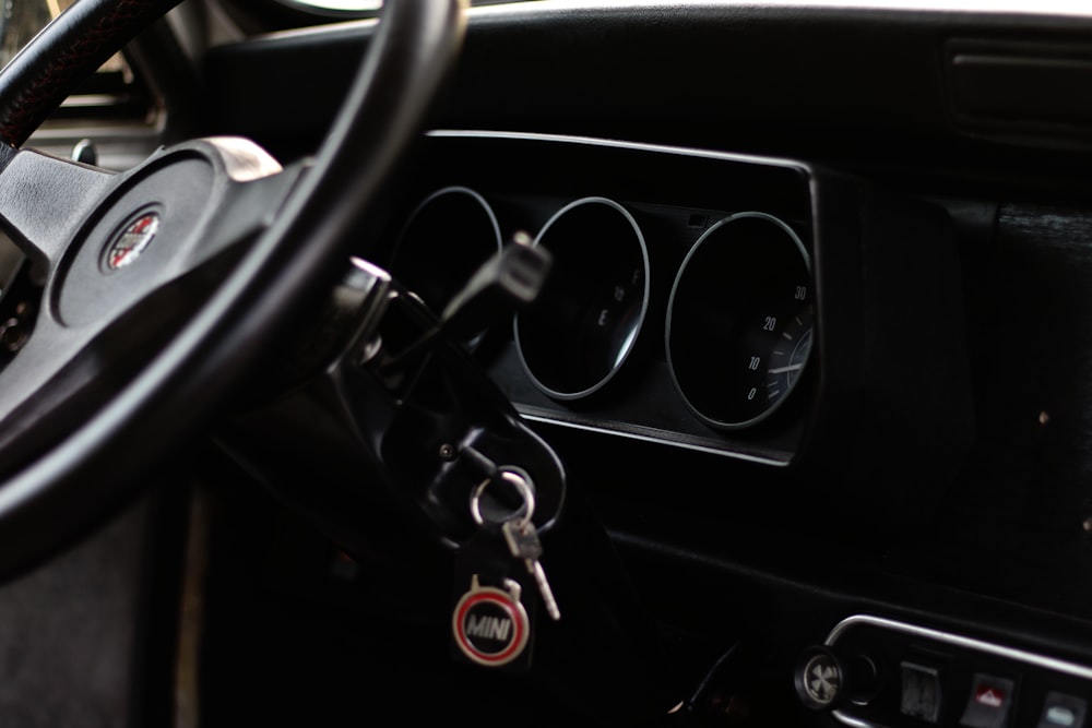 a close up of a steering wheel of a car