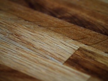 Close-up of wooden furniture details highlighting craftsmanship and natural textures.