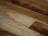 A close-up of beautifully crafted teak wood details and grains.