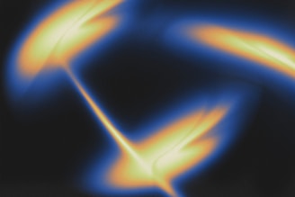 a blurry image of a yellow and blue object