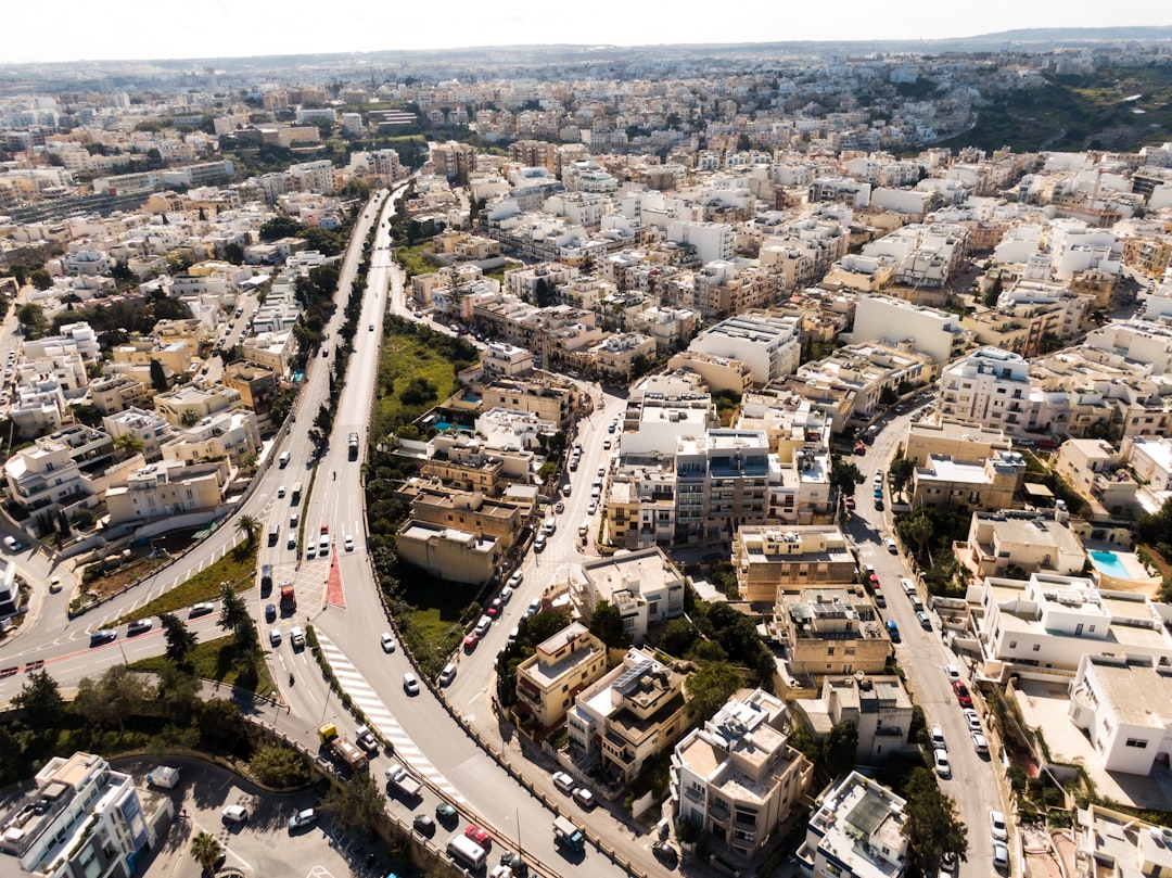 an aerial view of a city with lots of traffic, A Malta city.