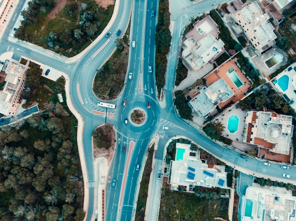 an aerial view of a street intersection in a city