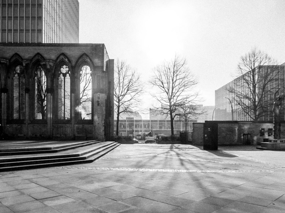 a black and white photo of a courtyard