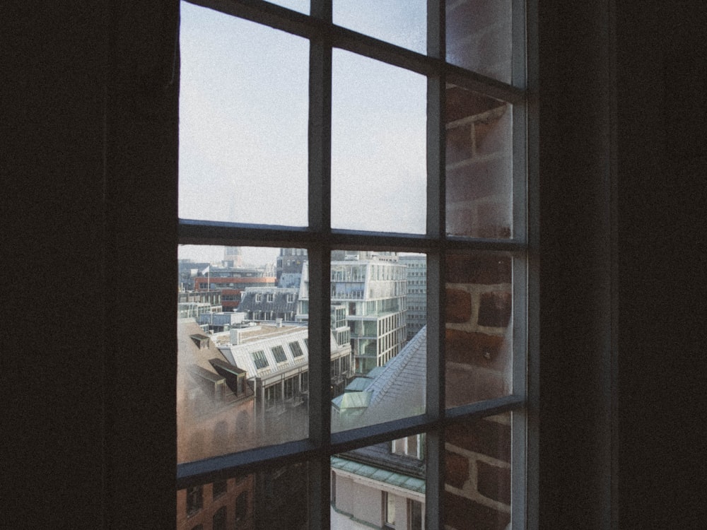 a window with a view of a city outside