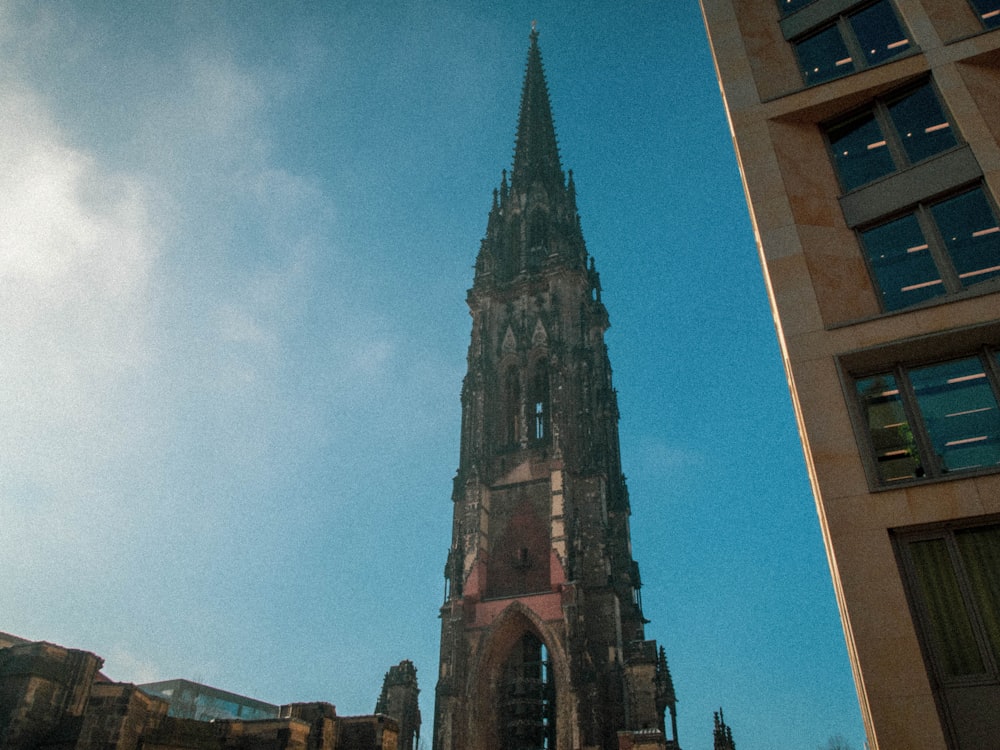 a very tall building with a clock on it's side