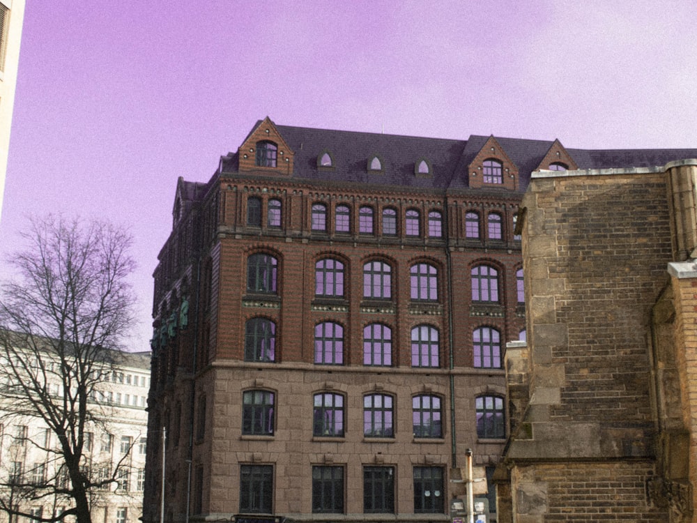 a large building with many windows on the side of it