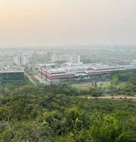 A serene campus view of a renowned Durgapur management institute with modern architecture.