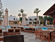 A luxurious pool area safeguarded by high-quality awnings.
