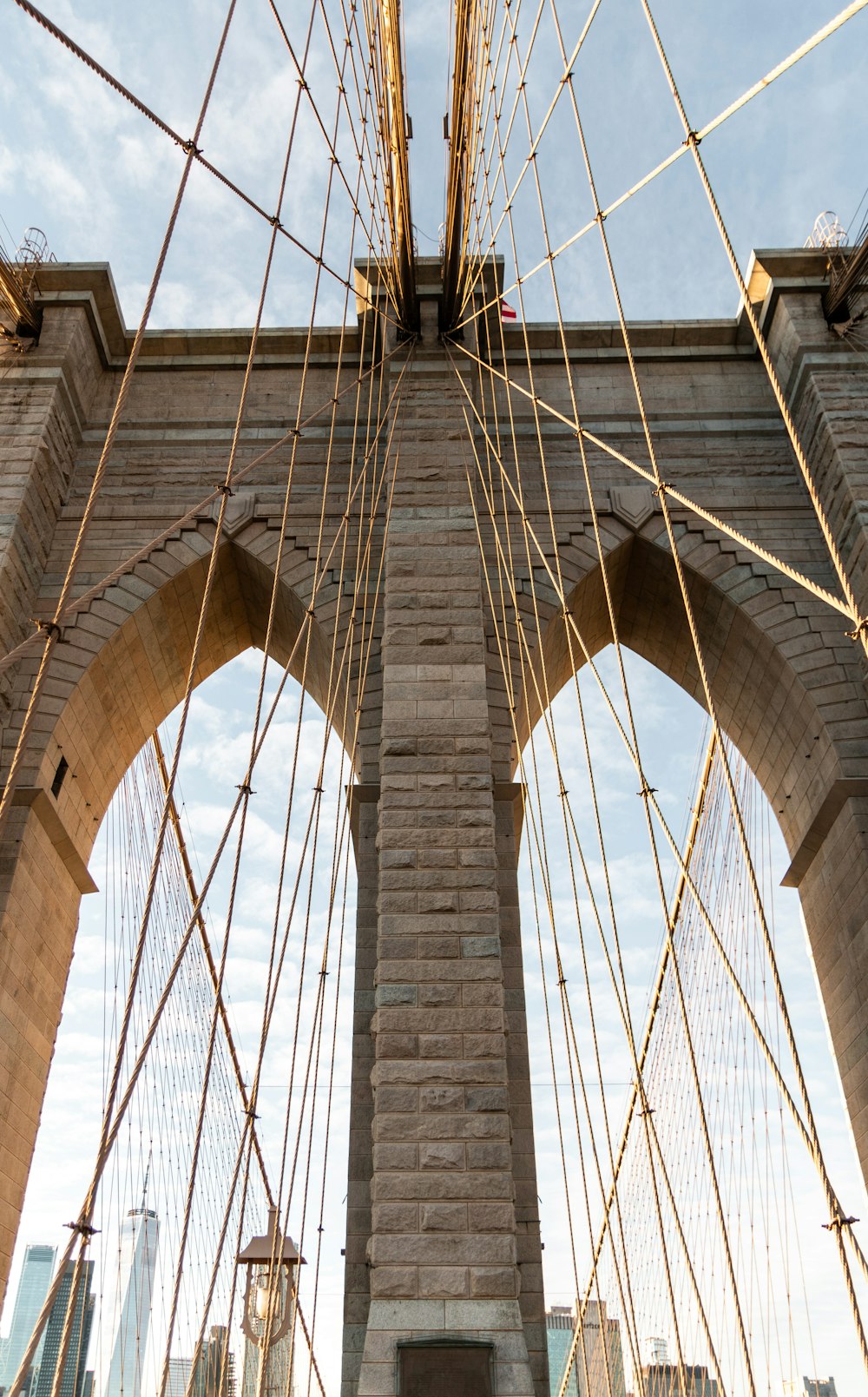 a view of the brooklyn bridge from the ground