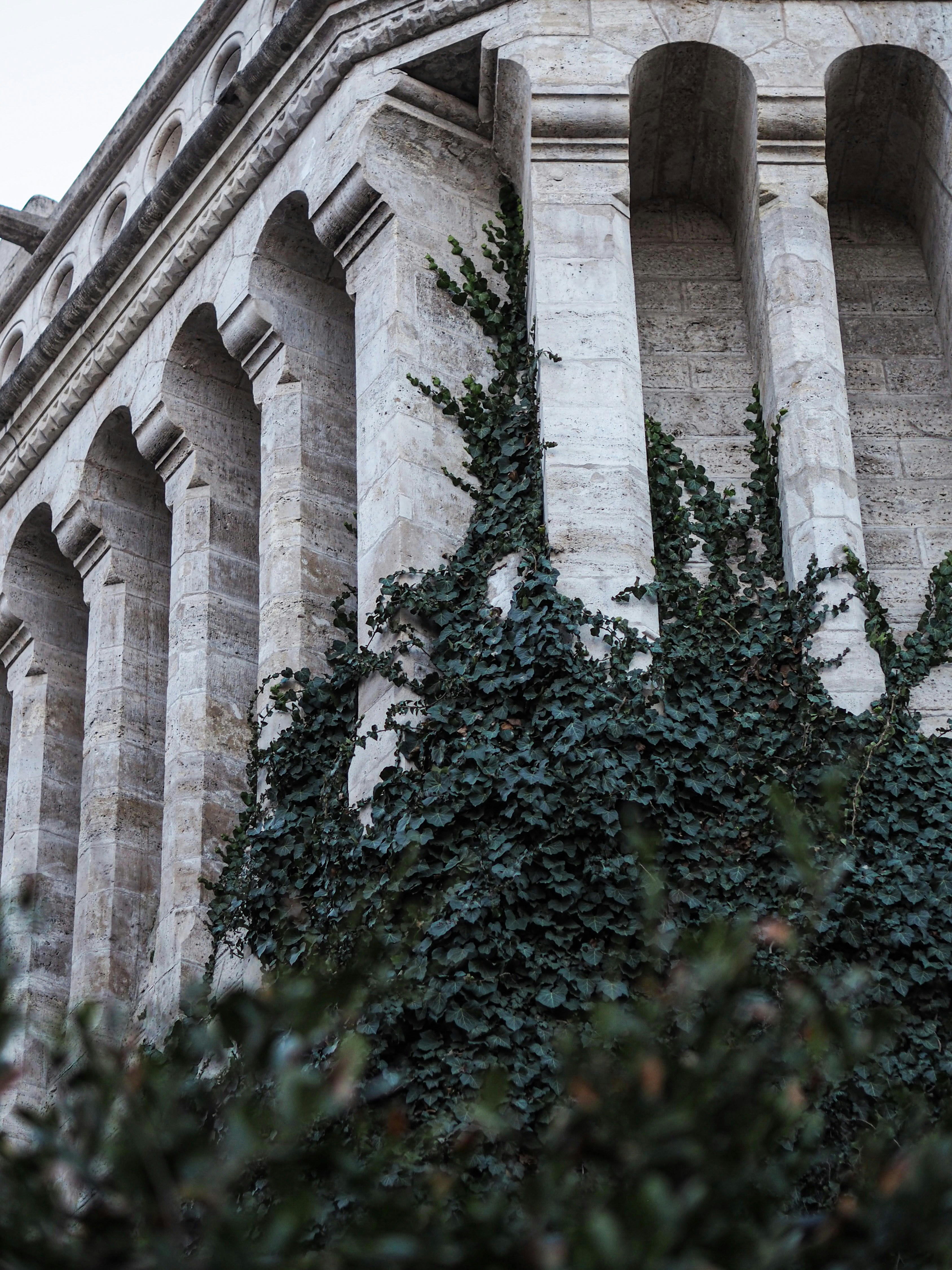 a tall building with a clock on the top of it