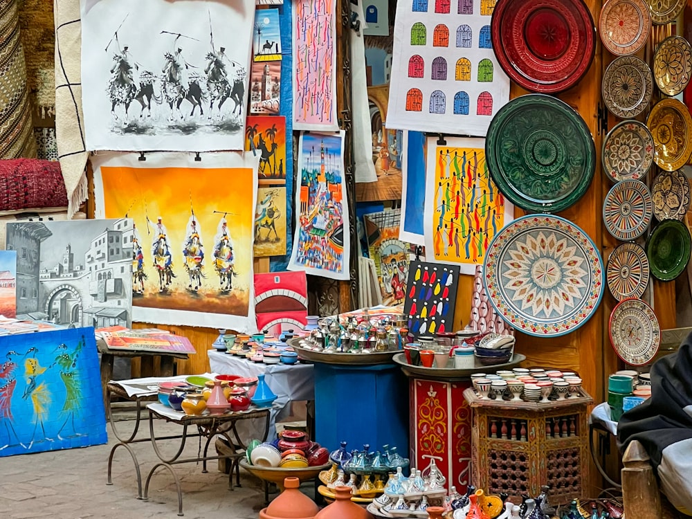 a man sitting on a chair in front of a store