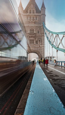 a long exposure shot of people walking on a bridge