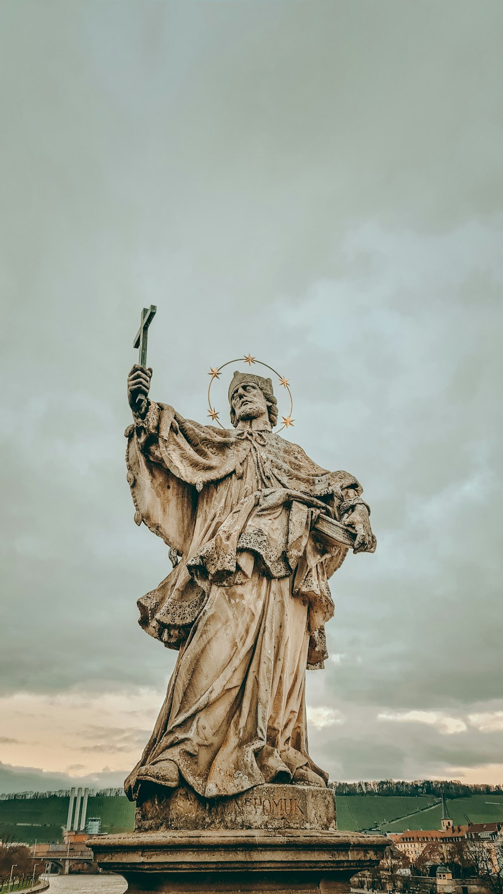 a statue of a woman holding a gun